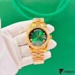 Rolex Day‑Date 40 – Green Ombré Roman Dial – Yellow Gold Fluted Bezel – President Bracelet – Ref. 228238