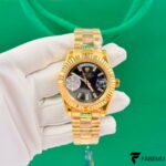Rolex Day‑Date 40 – Yellow Gold – Black Dial with Baguette Diamonds – President Bracelet