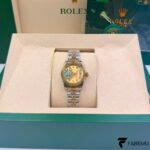 Rolex Lady‑Datejust 28 – Champagne Diamond Dial – Yellow Gold Fluted Bezel – Jubilee Bracelet – Ref. 279173‑0011