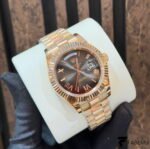 Rolex Day‑Date 40 – Slate Roman Dial – Everose Gold Fluted Bezel – President Bracelet – Ref. 228235